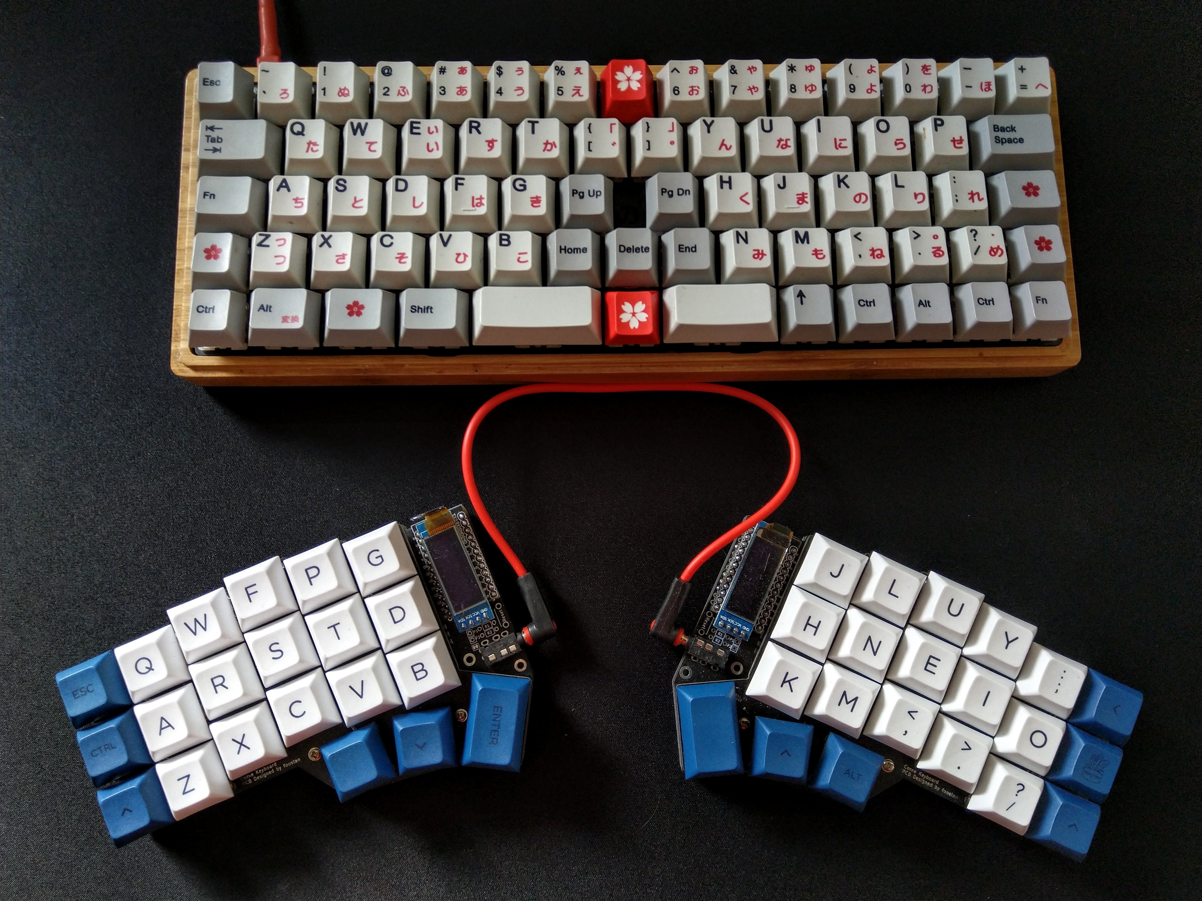 Katana60 and The Corne keyboard next to each other.
