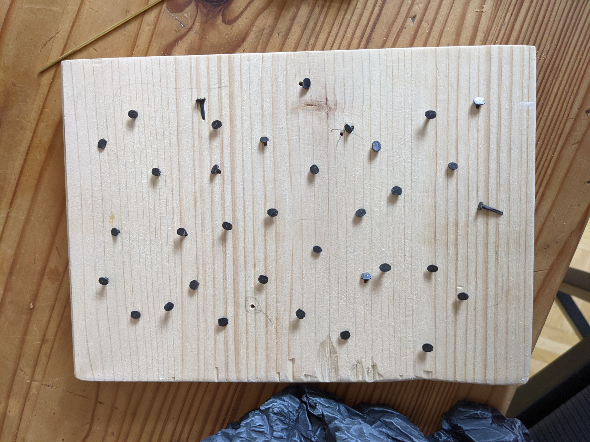 I was afraid plaster wouldn't stick to the wood enough so I have hammered some short nails into the wood and left their heads sticking out a millimetre or two.