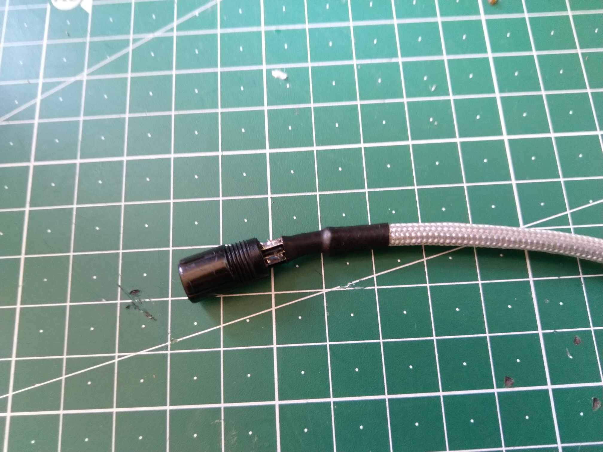 The first part of aviation connector solder and covered with heat-shrink.