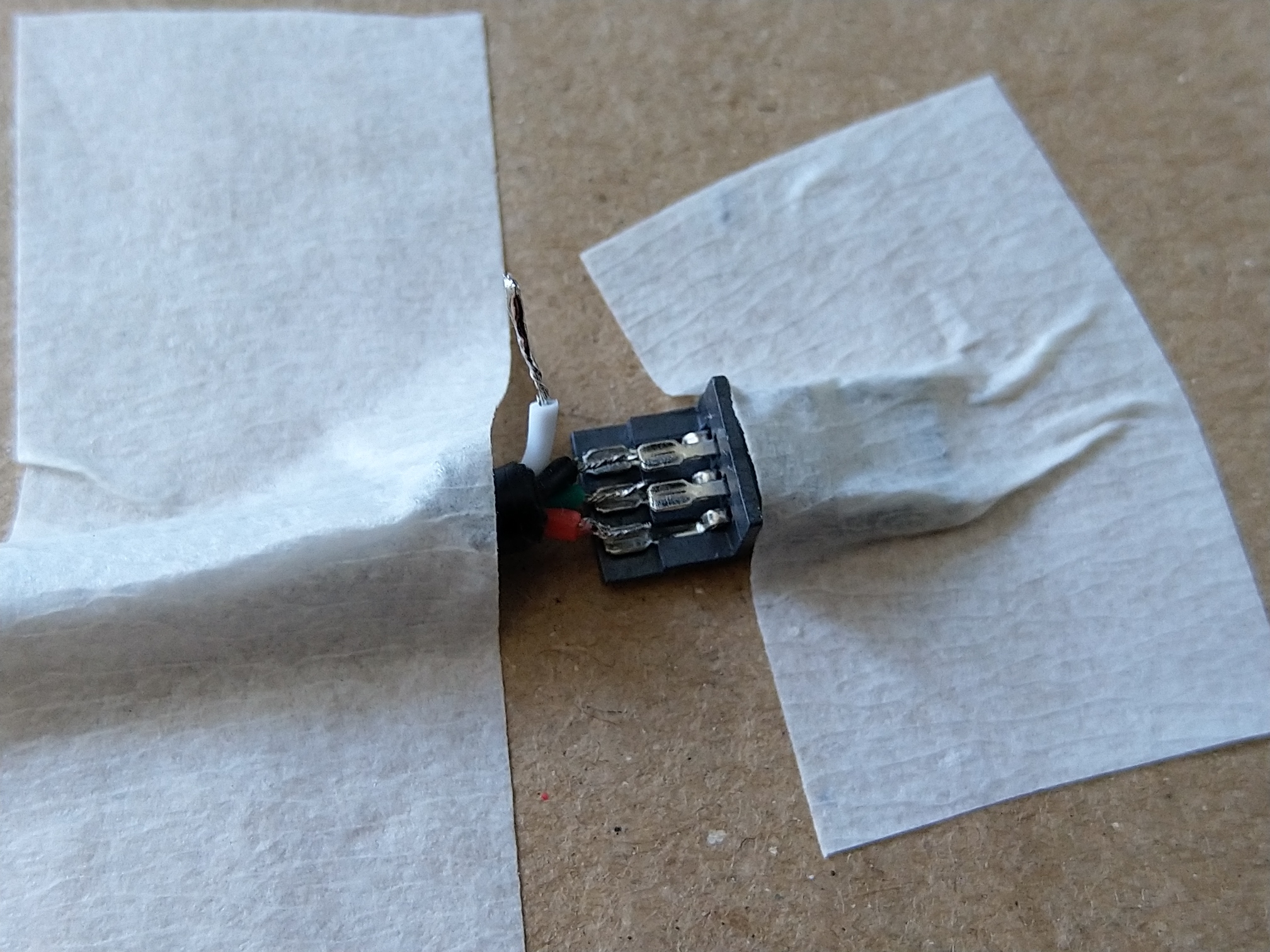 Soldering USB-mini connector. Since this is the second connector on the piece of cable, make sure you have your heat-shrink already on the cable before you start with this step.