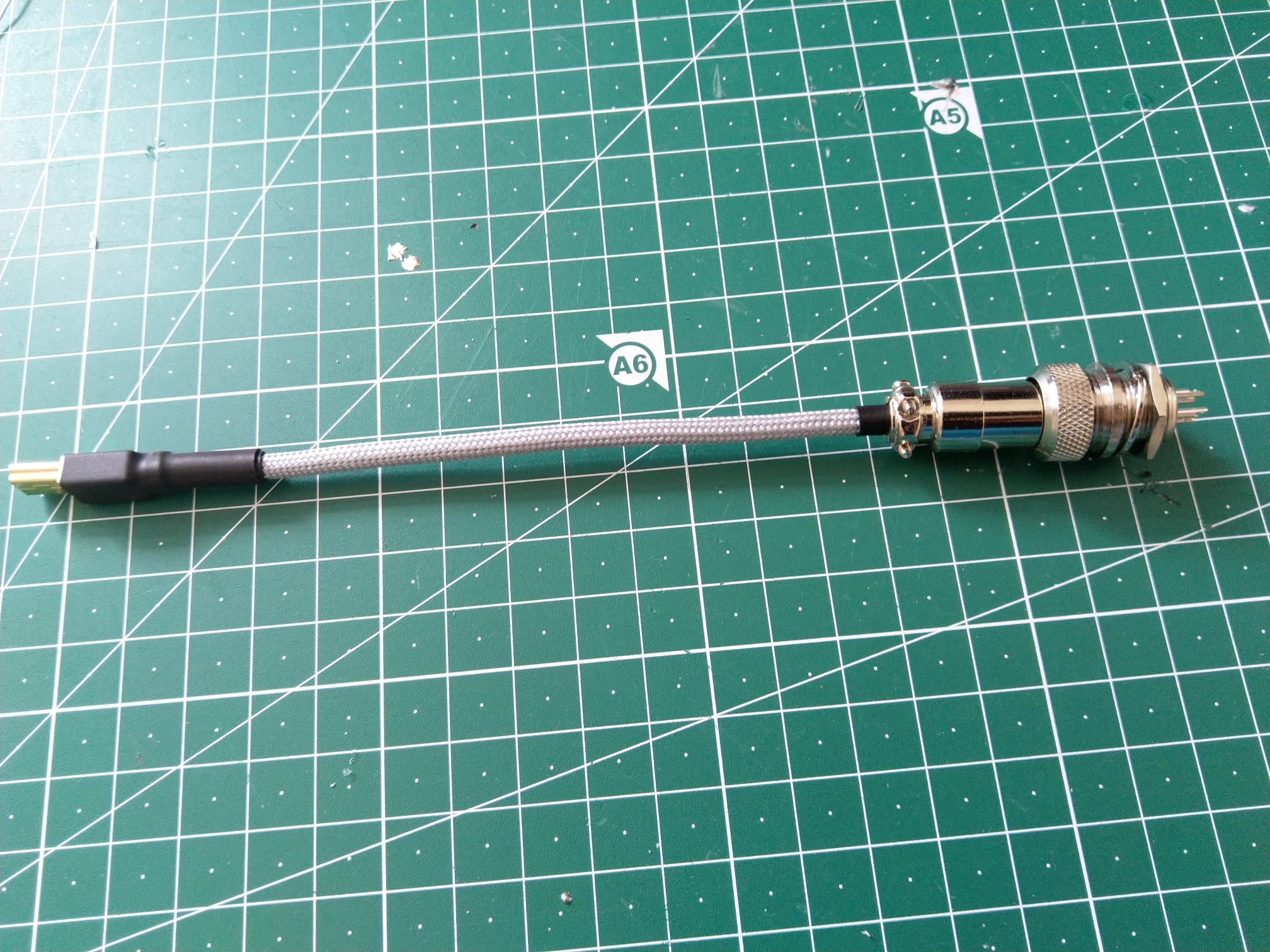 The second heat-shrink covering the connector added and therefore the first piece of cable completed.