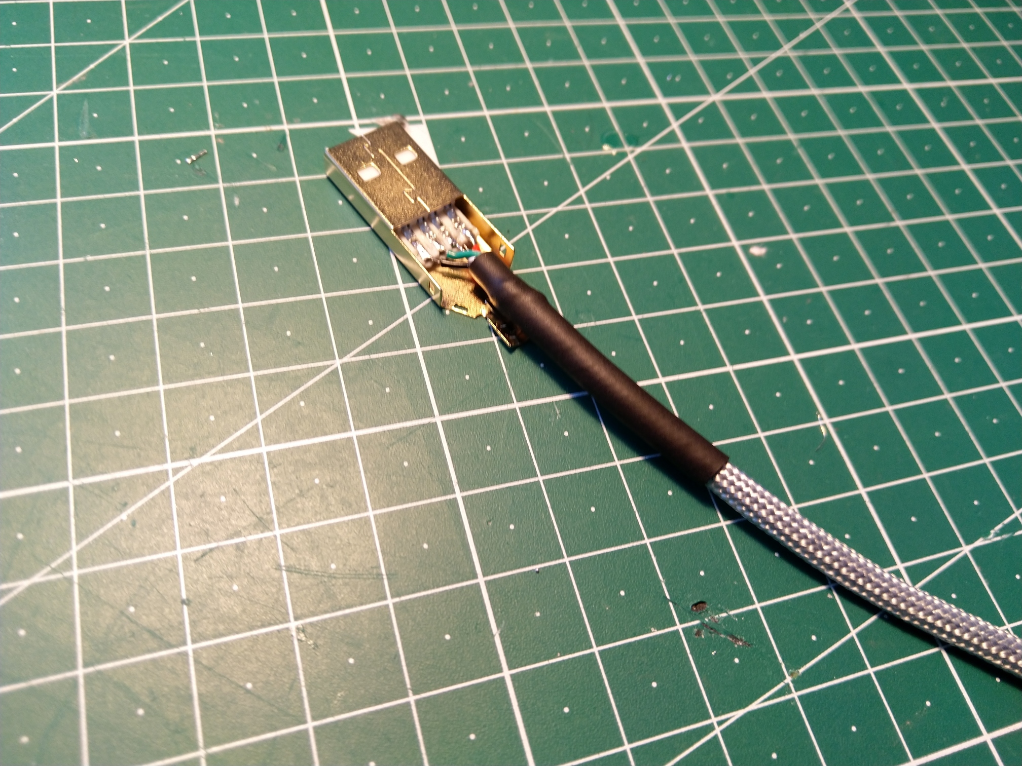 Soldered with the heat-shrink.